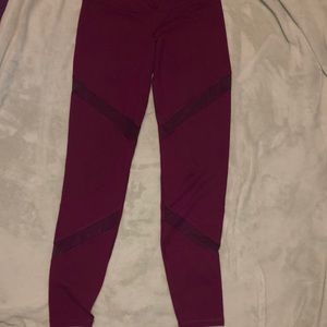 burgundy leggings with sheer cutouts